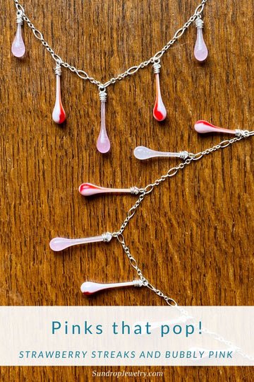 Pinks that pop! Glass jewelry with strawberry red streaks on a pale pink background: Limited edition glass teardrop jewelry collection