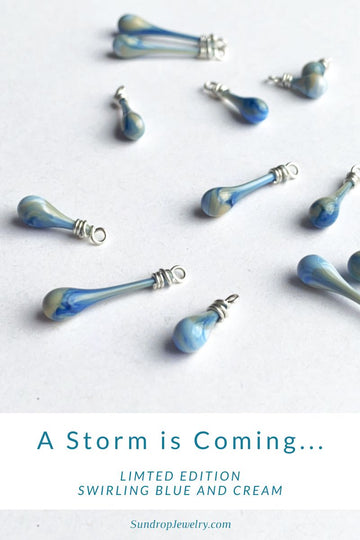 A Storm is coming... New limited edition swirling blue and cream glass teardrop jewelry is coming soon from Sundrop Jewelry