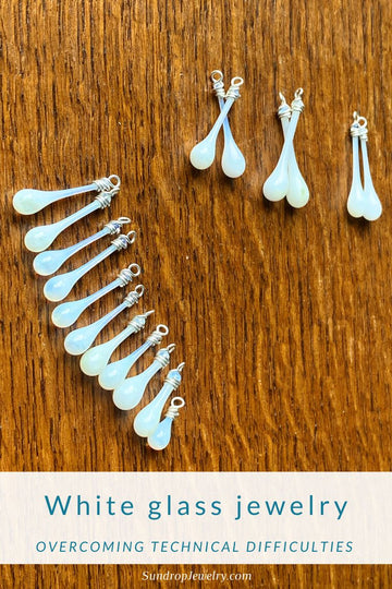 Making white glass jewelry for Pantone's 2026 color of the year, Cloud Dancer, required overcoming some technical difficulties...